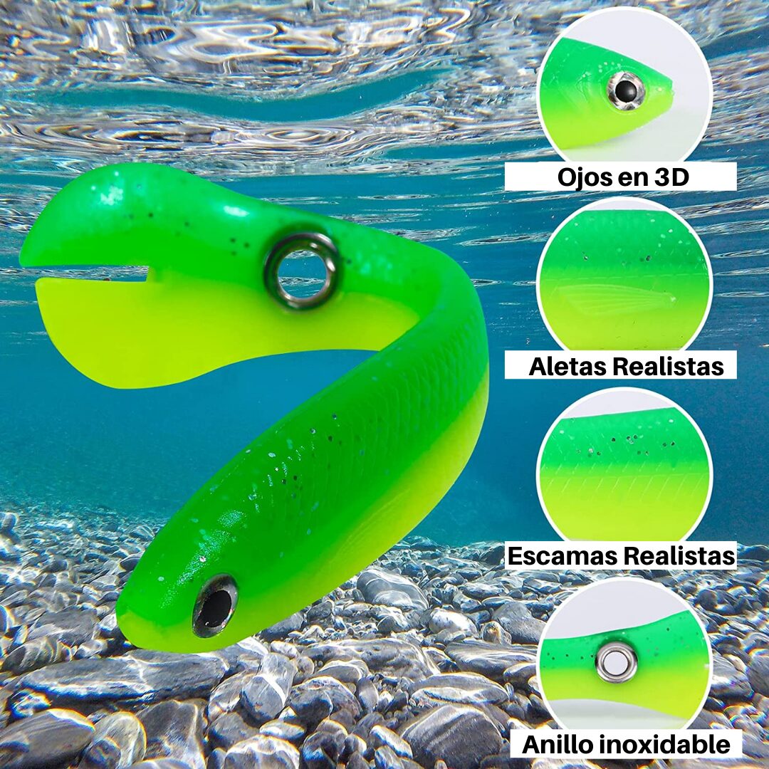Señuelo biónico blando verde y amarillo de 10cm, 6g, con ojos 3D, aletas y escamas realistas, sumergido en agua clara sobre piedras.