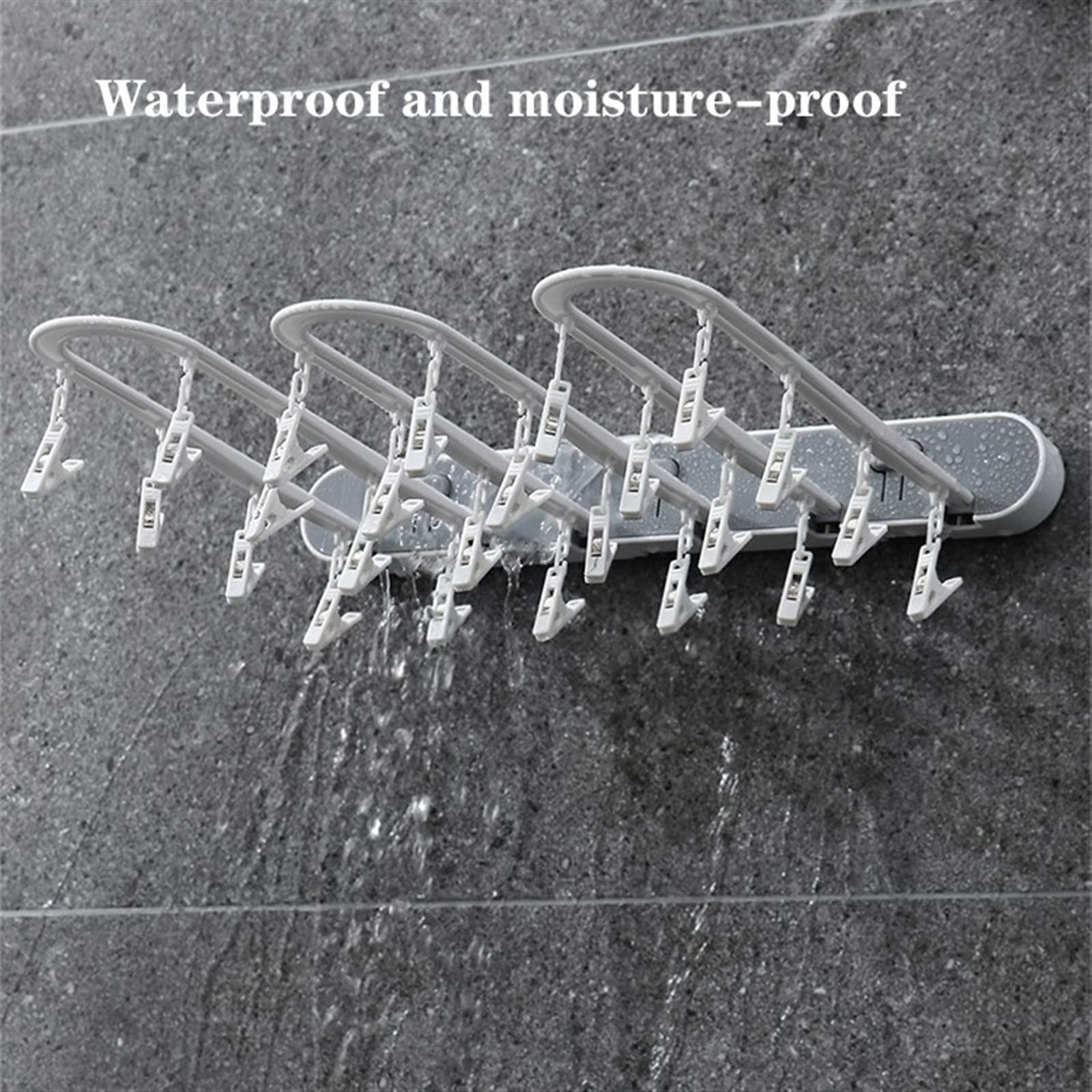 Tendedero plegable gris con 20 clips para ropa, resistente al agua, ideal para baños.