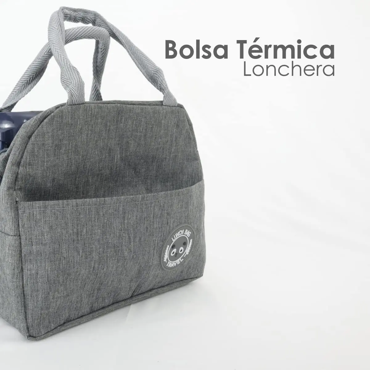 Lonchera térmica portátil gris con asas, bolsillo frontal y logo circular "Lunch Bag Travel".