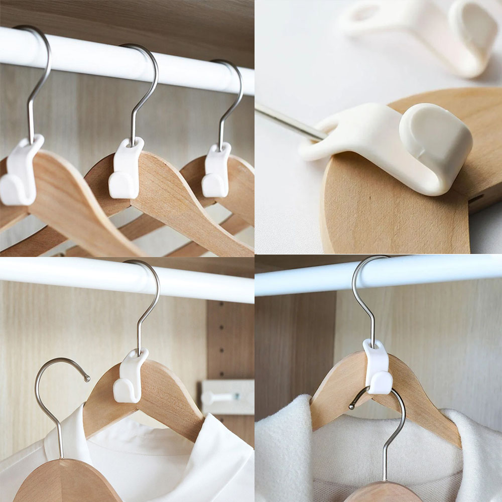 Ganchos ahorradores de espacio para colgar ropa en perchas de madera en closet.