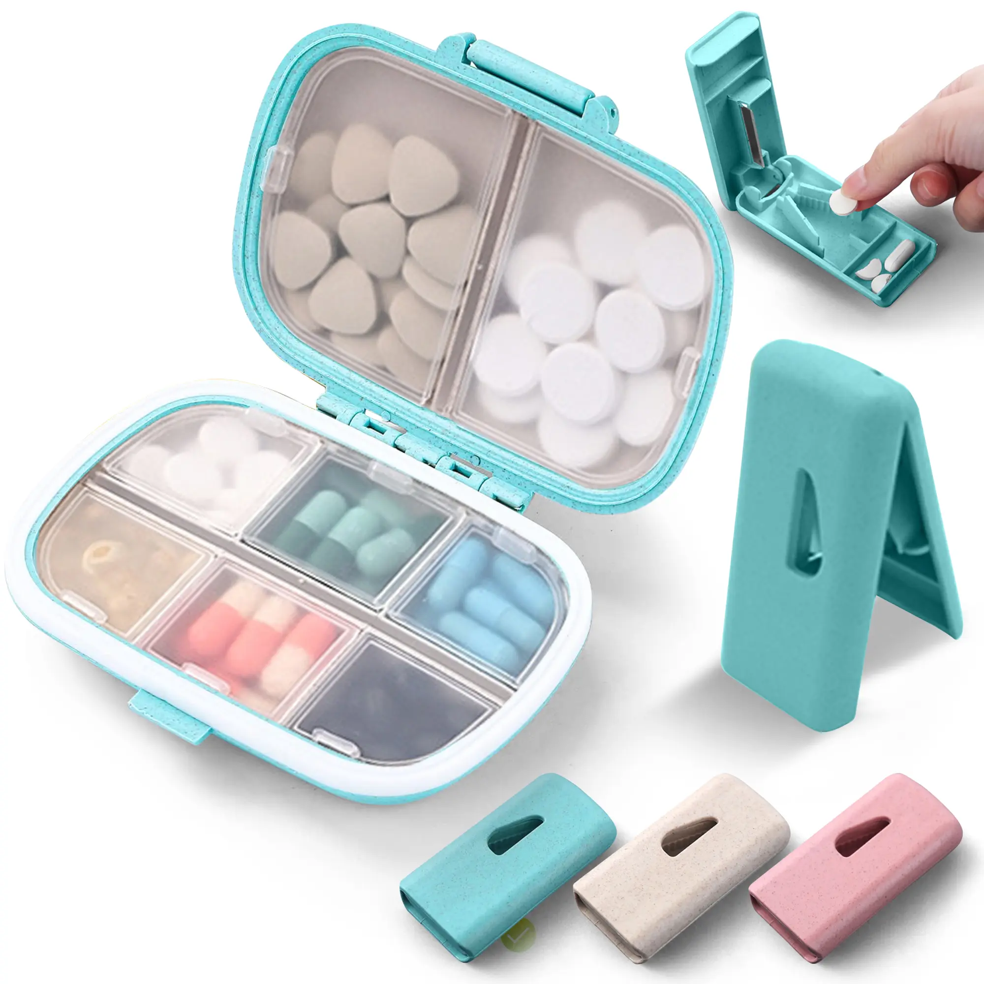 Pastillero organizador de medicamentos azul con cortador y pastillas, tres divisores.