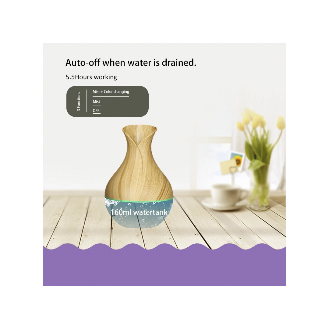 Difusor de aromas con acabado madera y 160ml de capacidad, autoapagado.