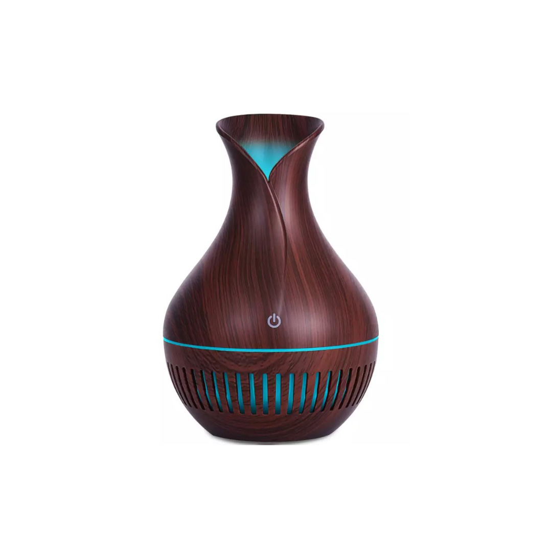 Difusor de aromas con acabado madera oscura, luz azul y diseño elegante de flor abierta.