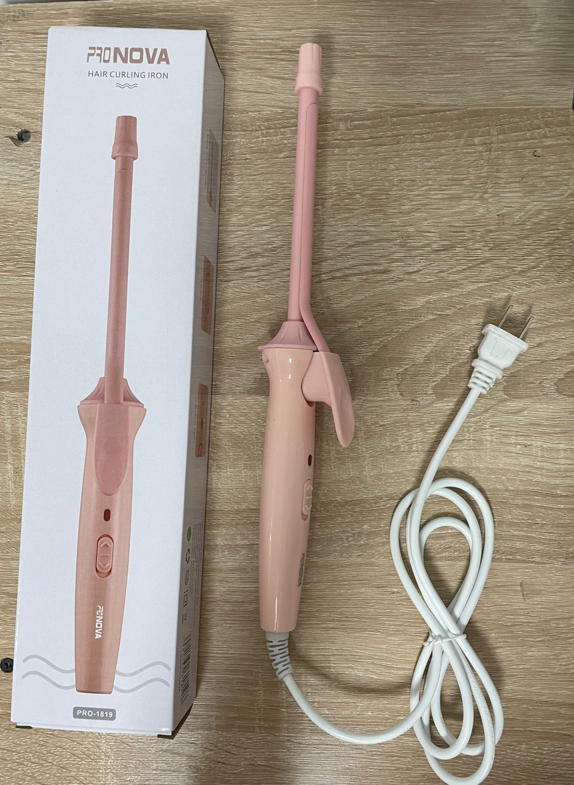 Pinza rizadora delgada rosa de 9mm para ondas y crespos. Incluye caja y cable.