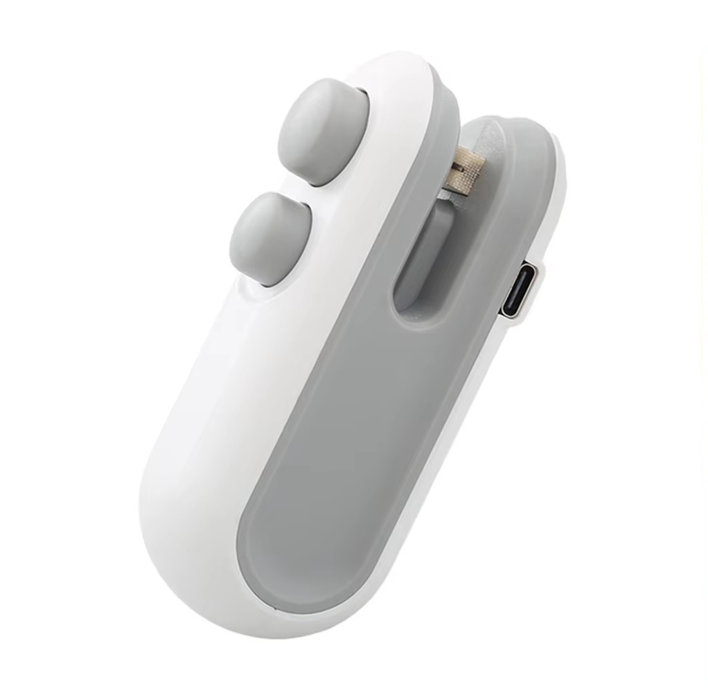 Mini sellador de bolsas 2 en 1 blanco y gris, con botones y puerto de carga USB, ideal para cerrar empaques.