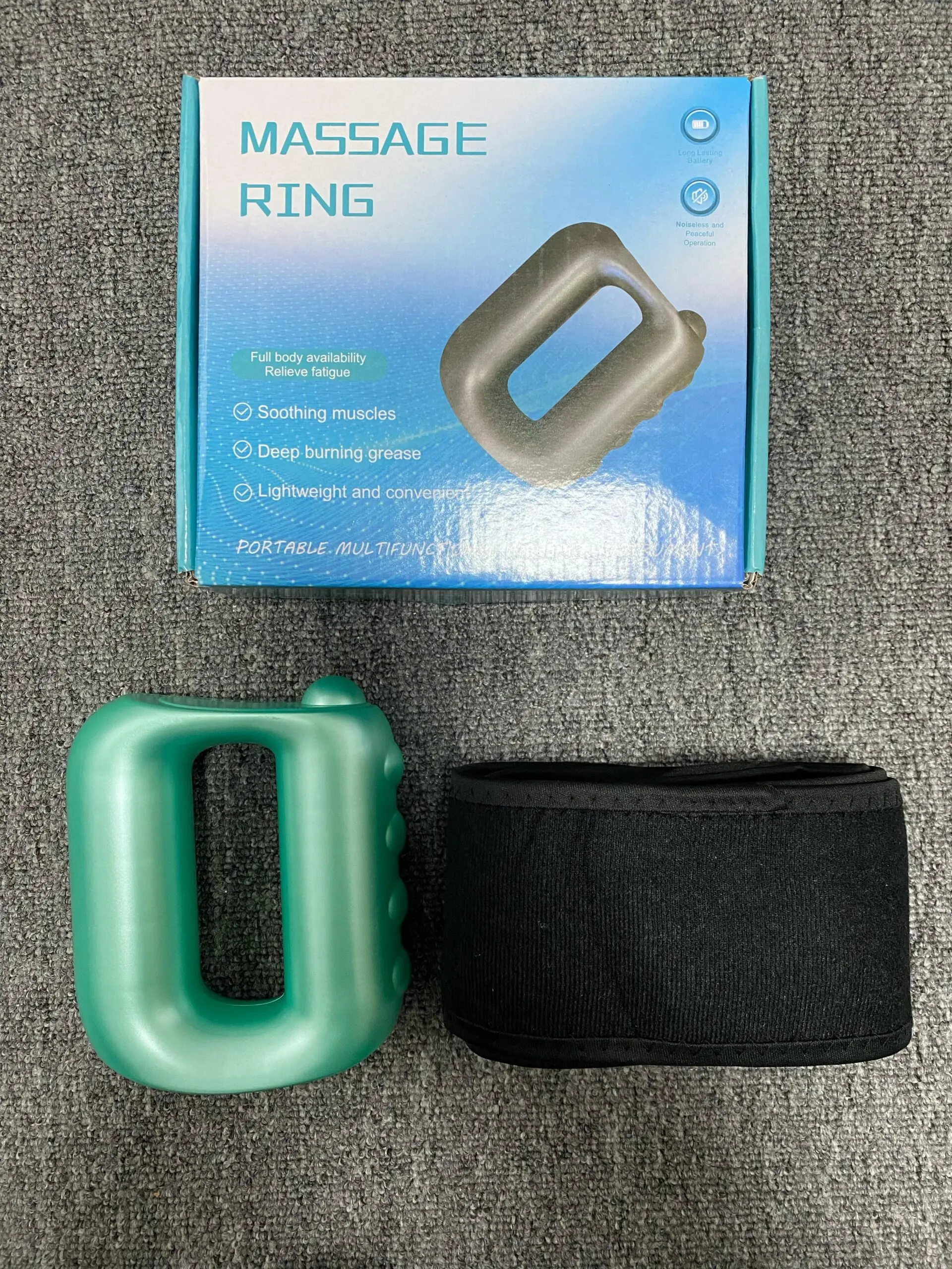 Anillo masajeador corporal verde y cinturón negro para alivio muscular y quema de grasa.