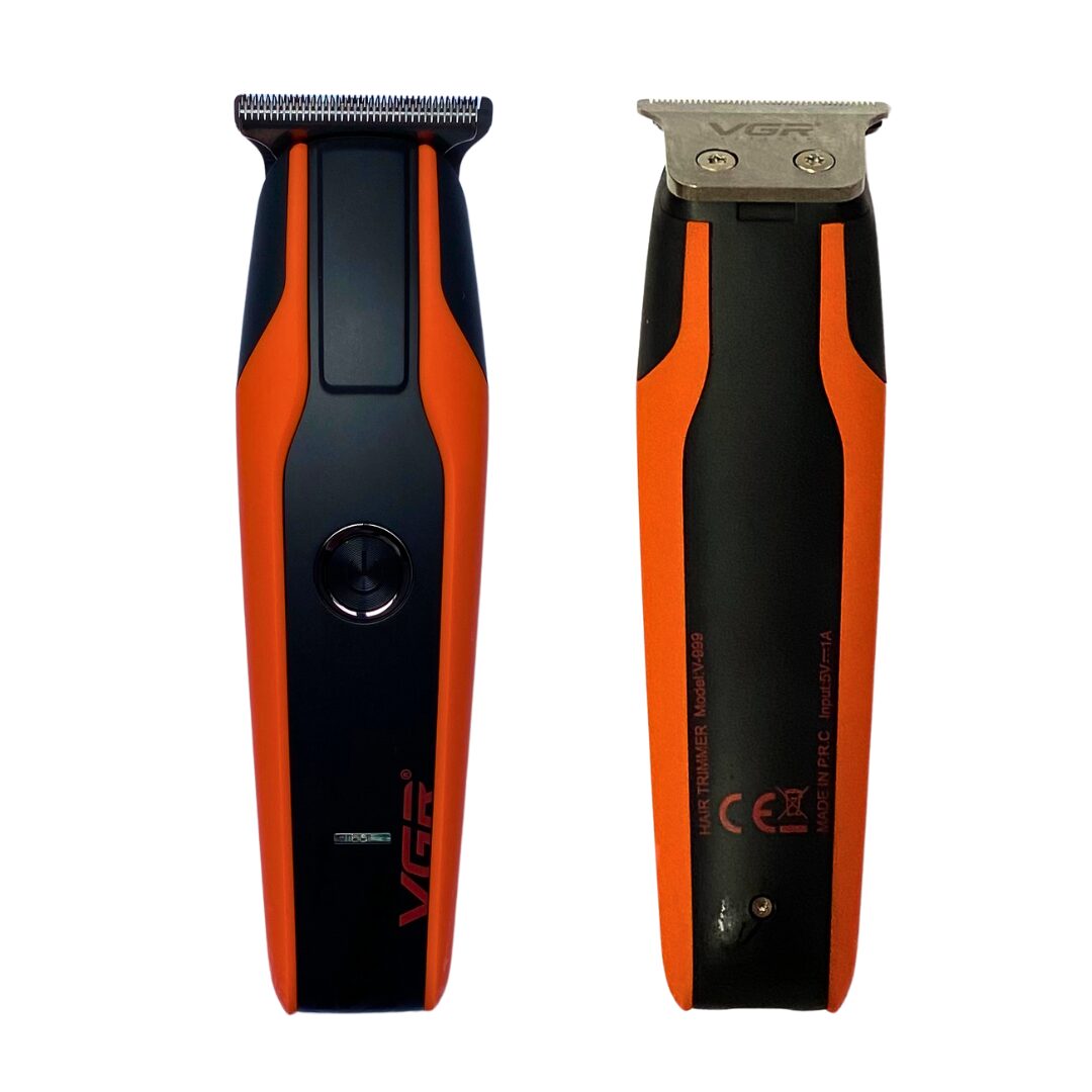 Recortadora VGR V-999 profesional naranja y negra, cuchillas de acero inoxidable.