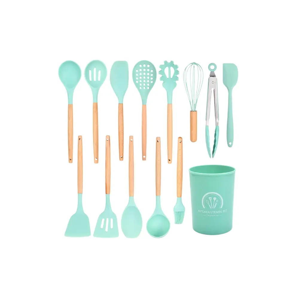 Set de 12 utensilios de cocina en silicona verde menta y mangos de madera, incluye espátulas, cucharas, batidor, pinzas, brocha y recipiente organizador.