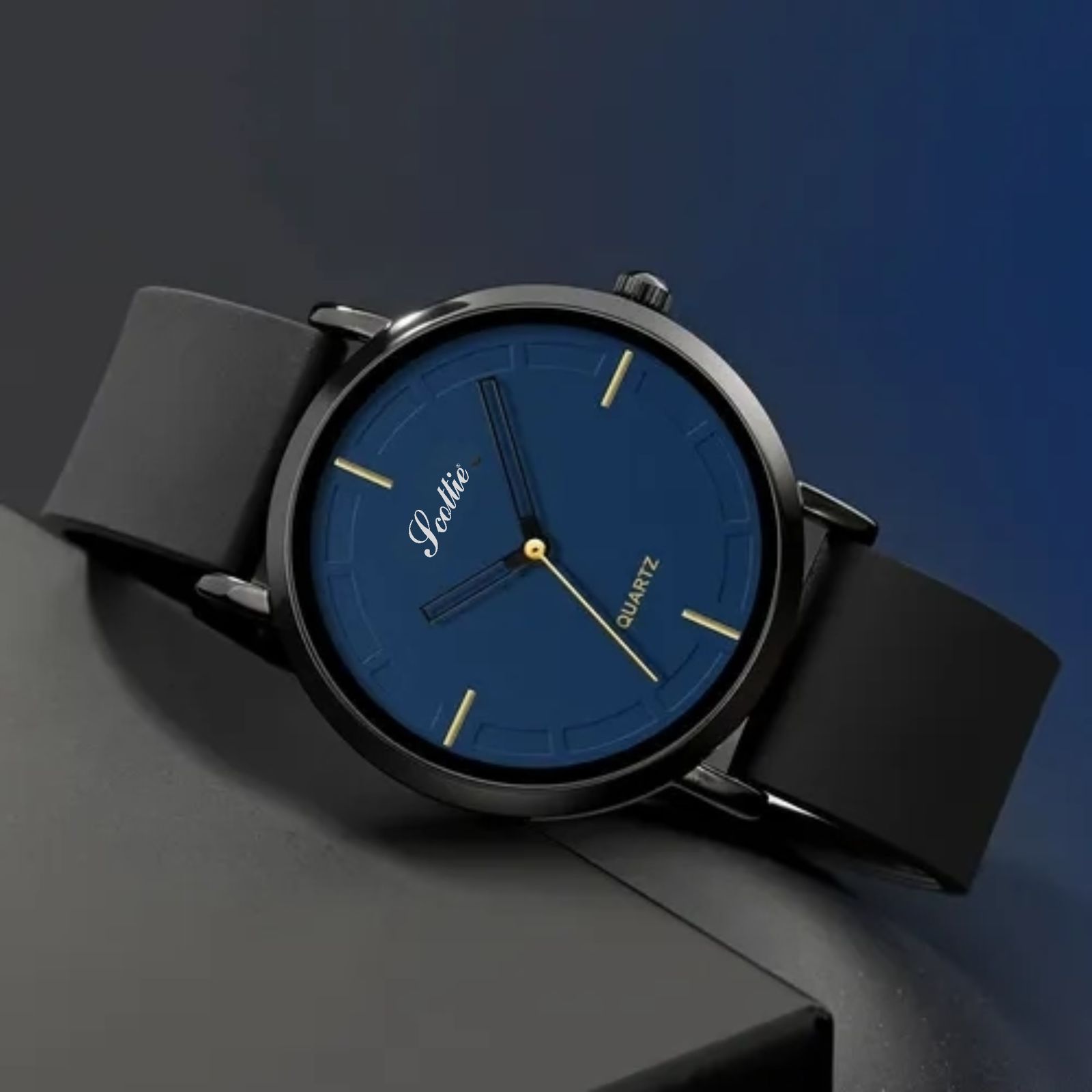 Reloj Scottie azul con correa de silicona negra. Estilo minimalista, sumergible.