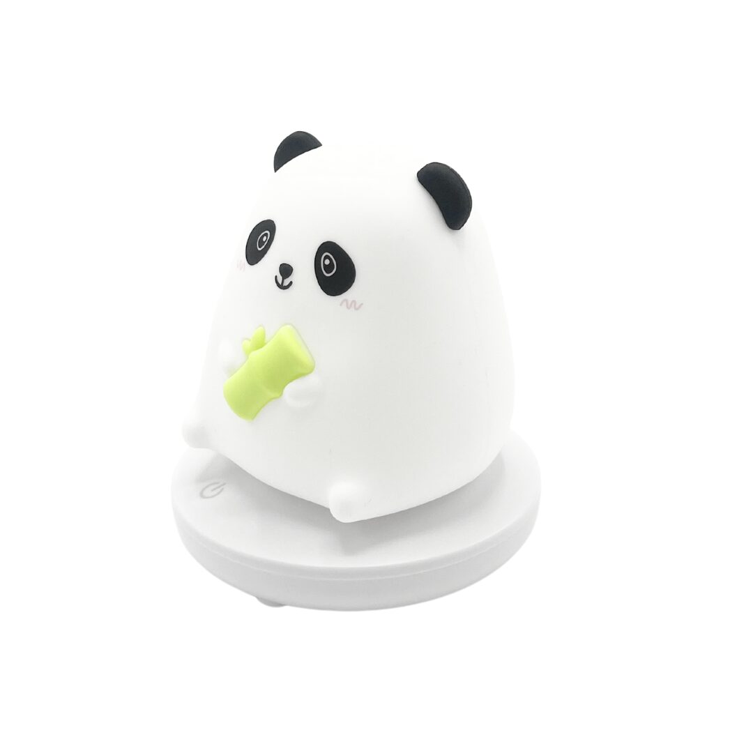 Lampara siliconada animada de panda blanco comiendo bambú verde, con base redonda.