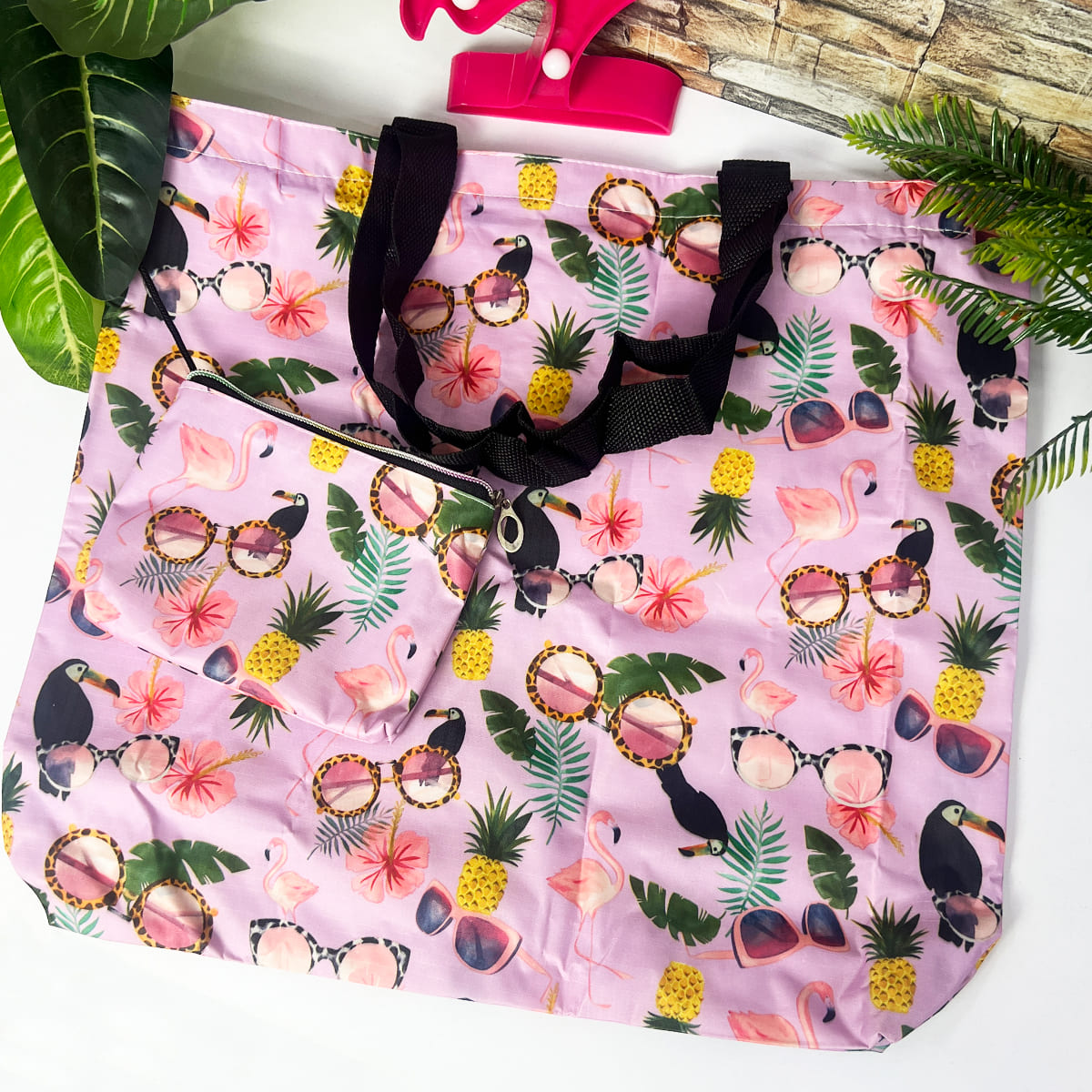 Set x2 bolsas reutilizables plegables con diseño de flamencos, tucanes y gafas de sol sobre fondo lila.