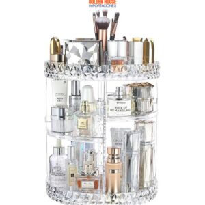 Organizador de maquillaje giratorio de acrílico transparente con botellas de perfume y brochas.