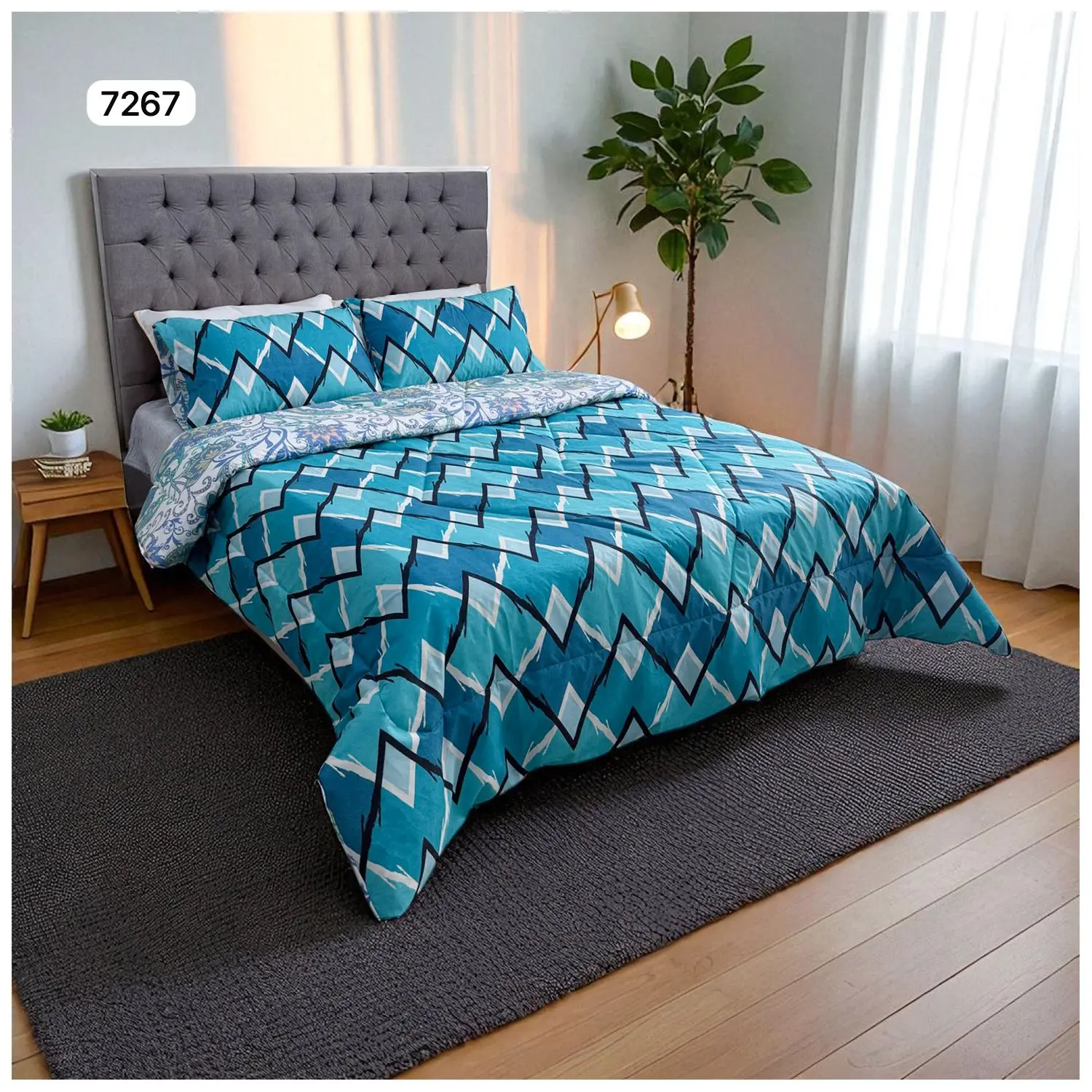 Edredón doble faz cama doble, diseño geométrico en tonos azules y blanco. Habitación moderna.