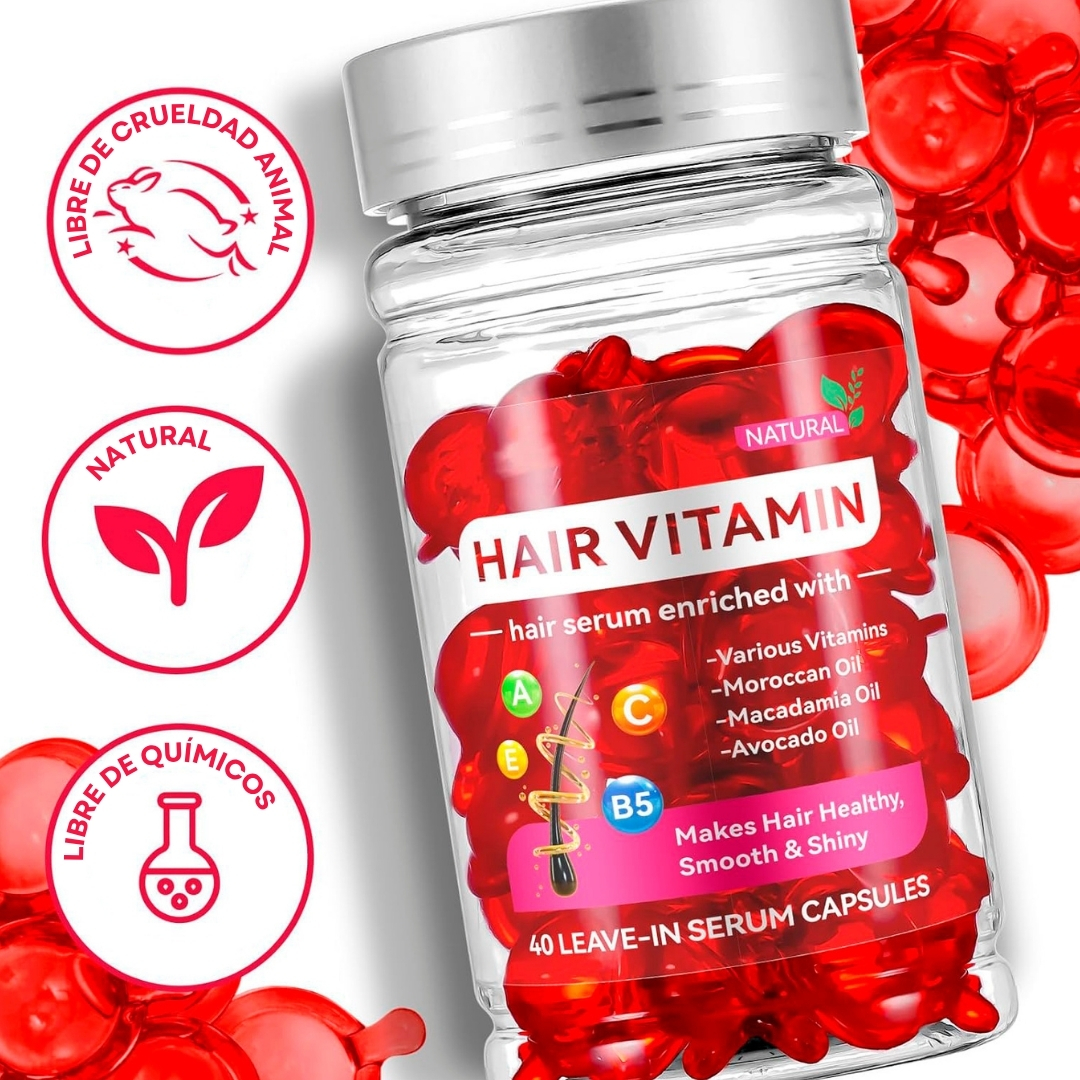 Frasco transparente con cápsulas rojas de suero capilar "Hair Vitamin", enriquecido con aceites y vitaminas.