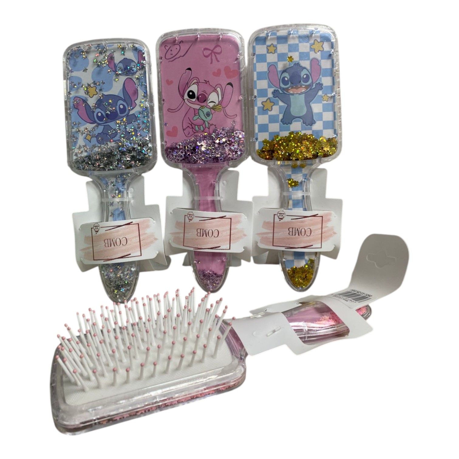 Set x2 cepillos desenredantes cabello Stitch brillante, uno azul con brillos plateados y otro rosa con brillos morados.