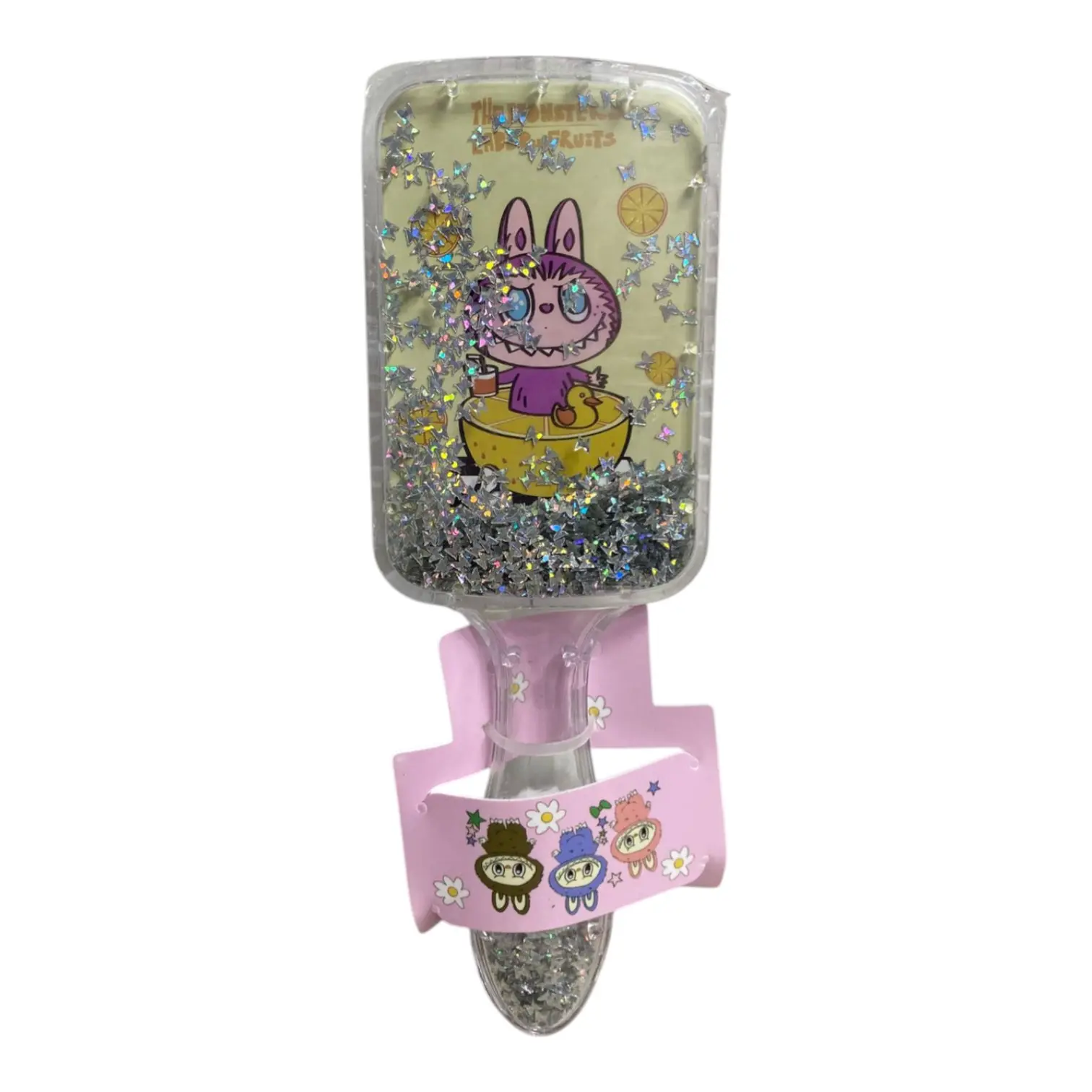 Cepillo desenredante Labubu con brillos plateados en forma de estrella, mango rosa con diseño de personajes.