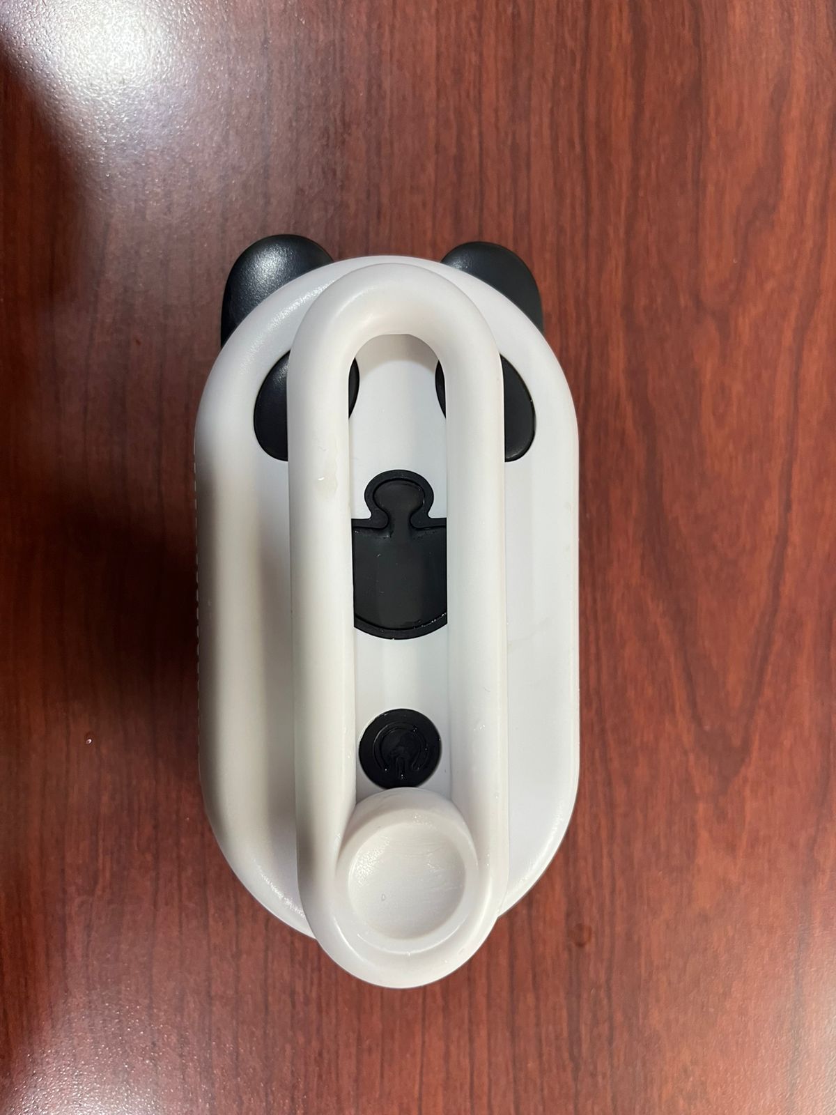 Set de cepillos para mascotas color blanco con detalles negros en forma de panda, con accesorio para vapor.