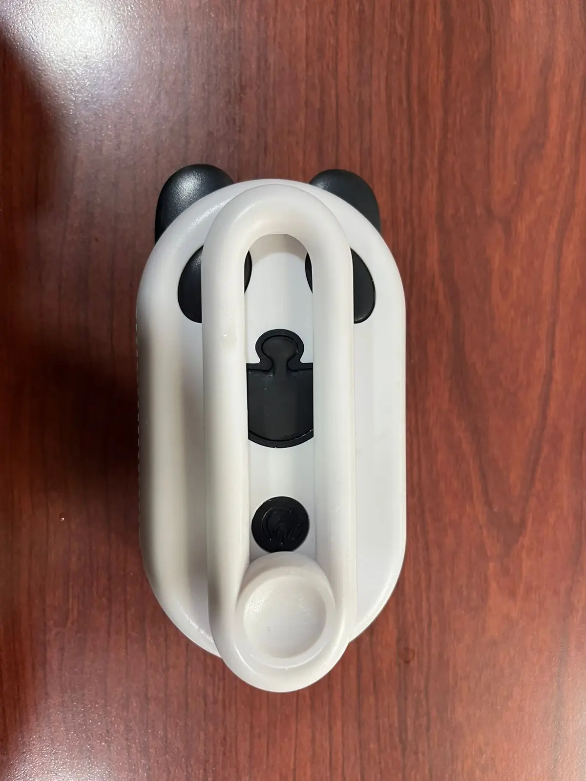 Set de cepillos para mascotas color blanco con detalles negros en forma de panda, con accesorio para vapor.