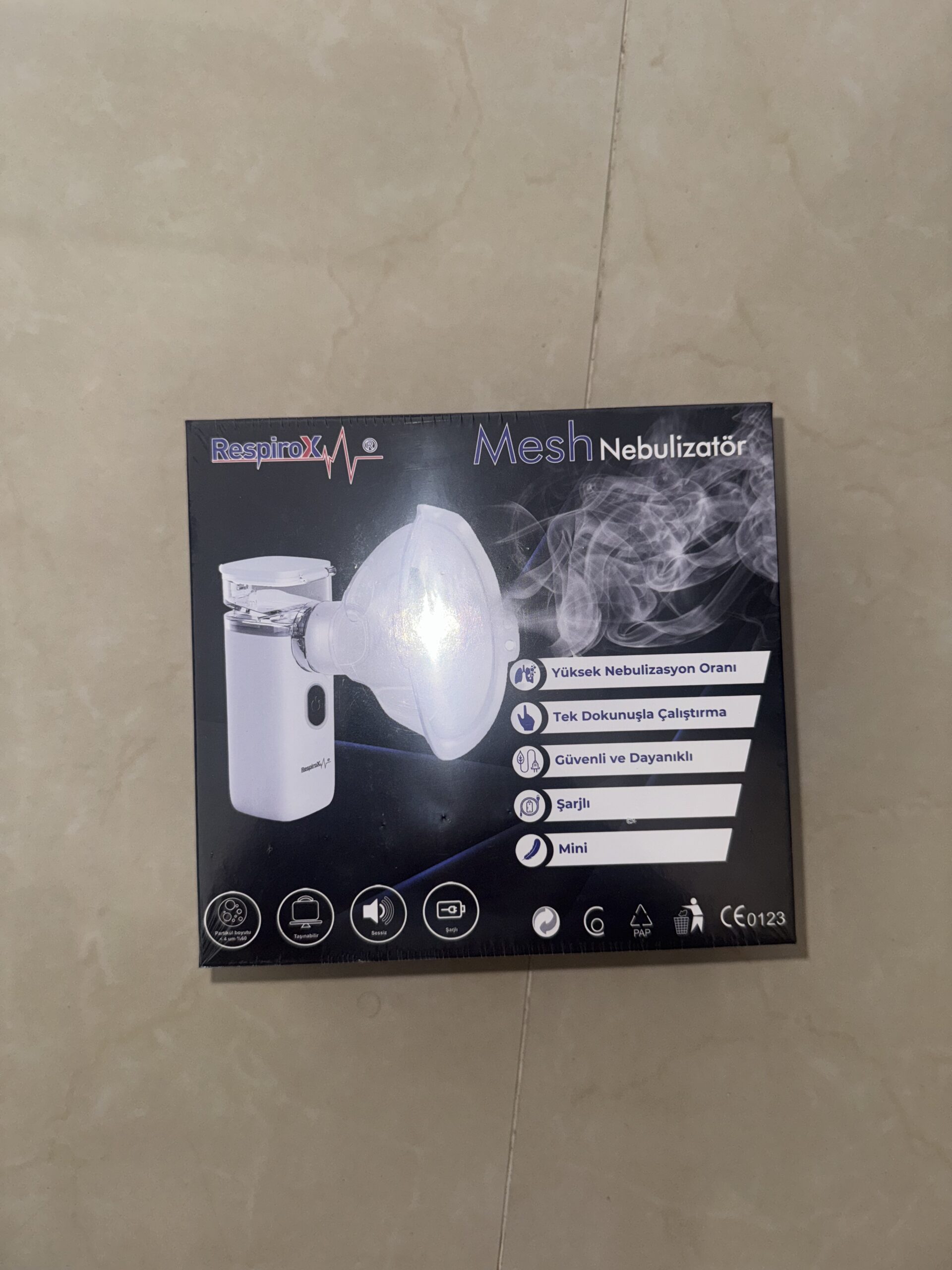 Nebulizador ultrasónico portátil RespiroX, blanco, con malla, para alivio respiratorio.