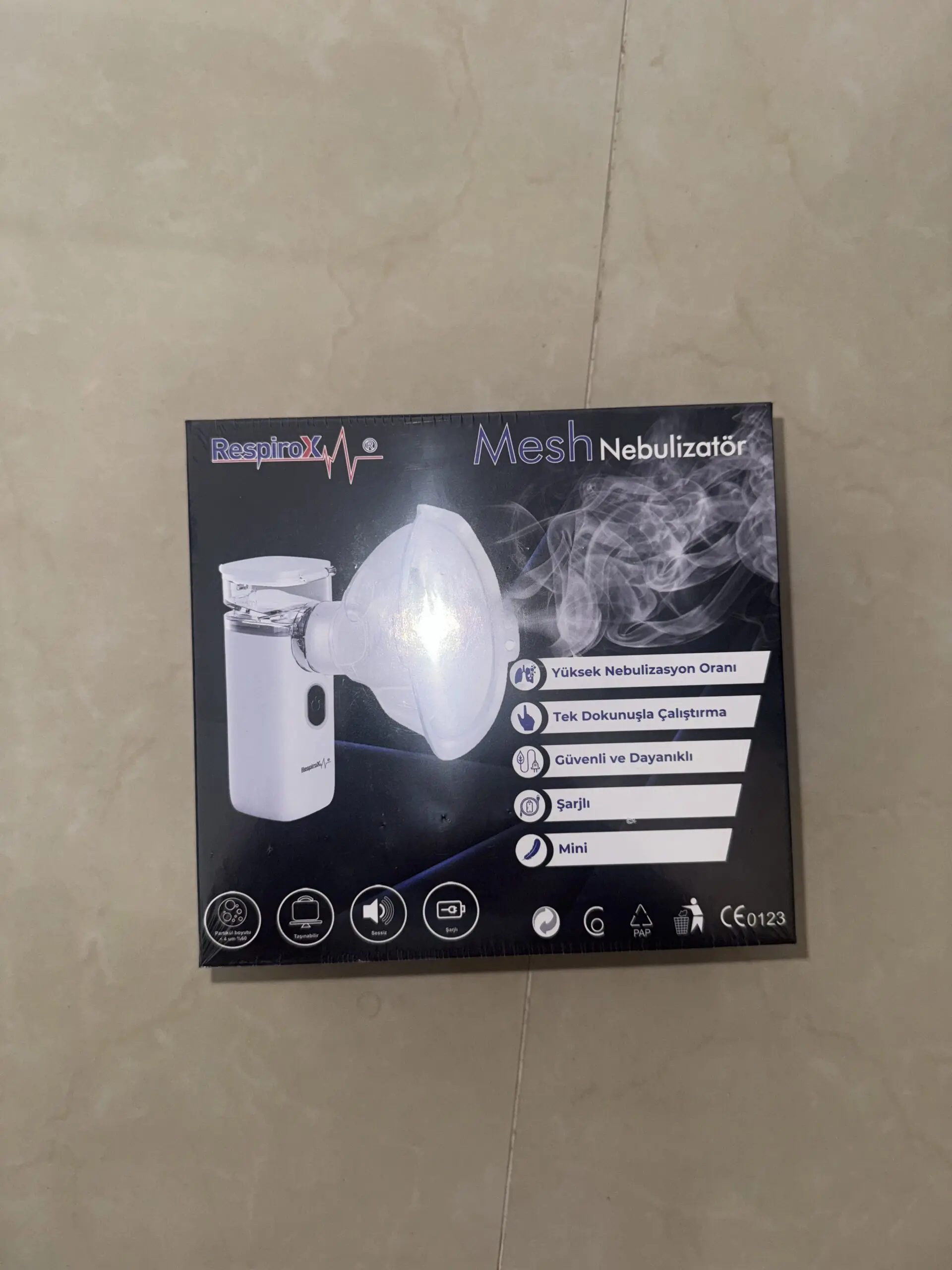 Nebulizador ultrasónico portátil RespiroX, blanco, con malla, para alivio respiratorio.