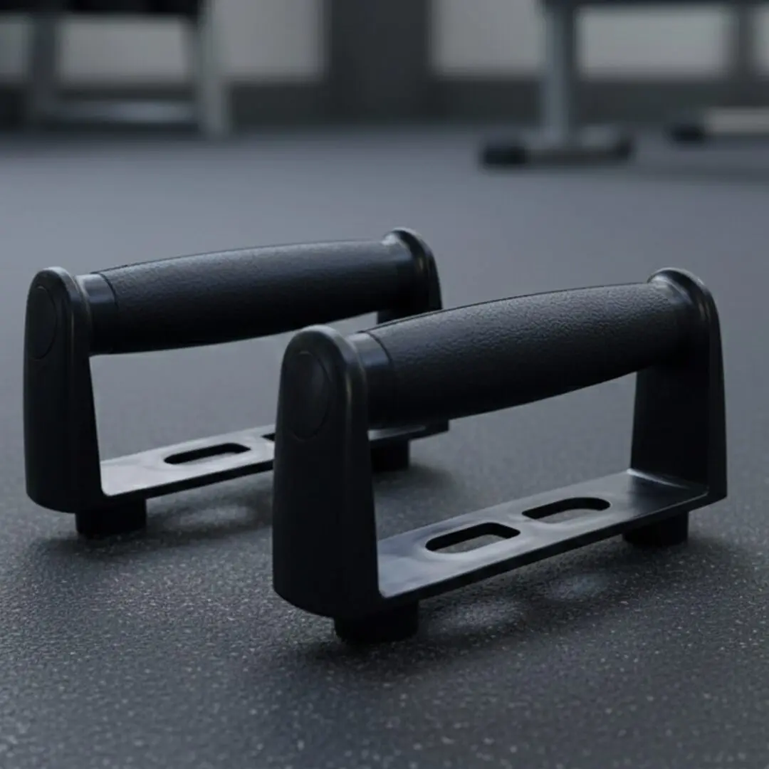 Soportes para flexiones negros con mangos texturizados, sobre superficie gris texturizada.