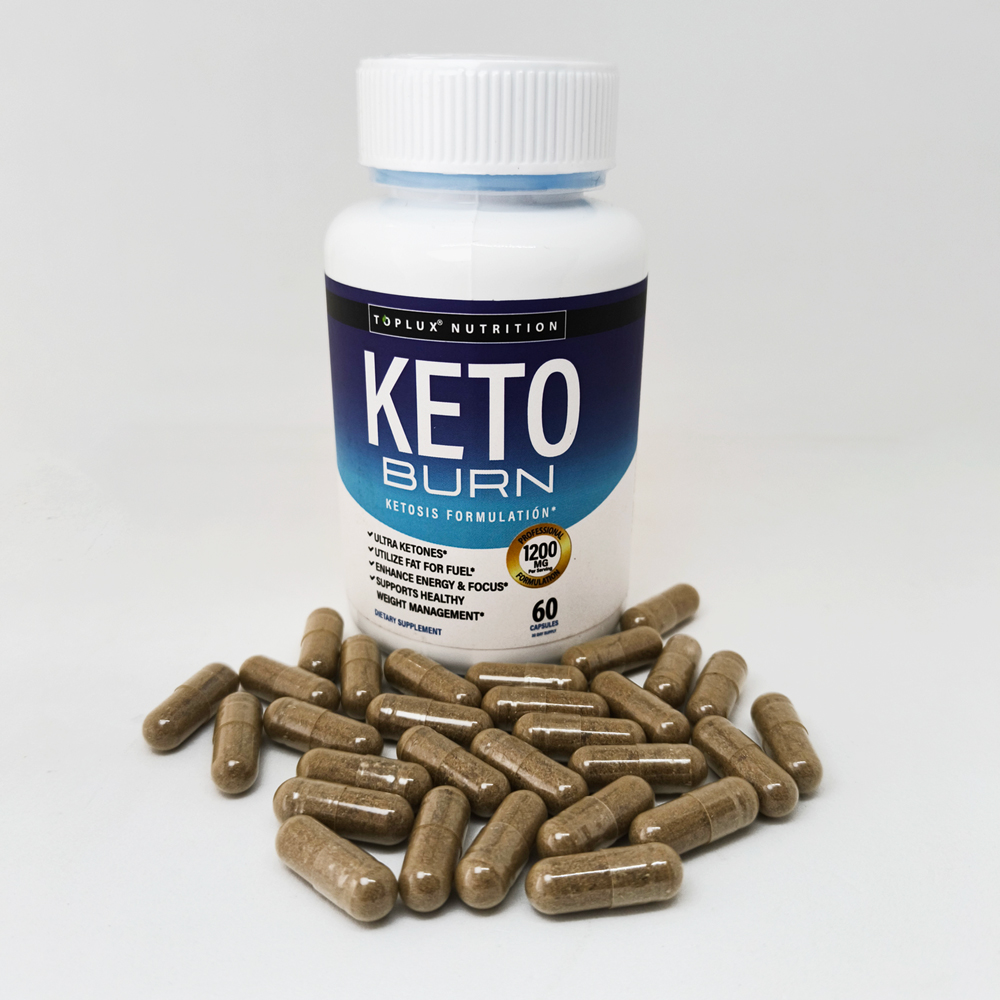 Suplemento Keto Burn en cápsulas, frasco blanco con etiqueta azul y dorada, rodeado de 25 cápsulas marrones.