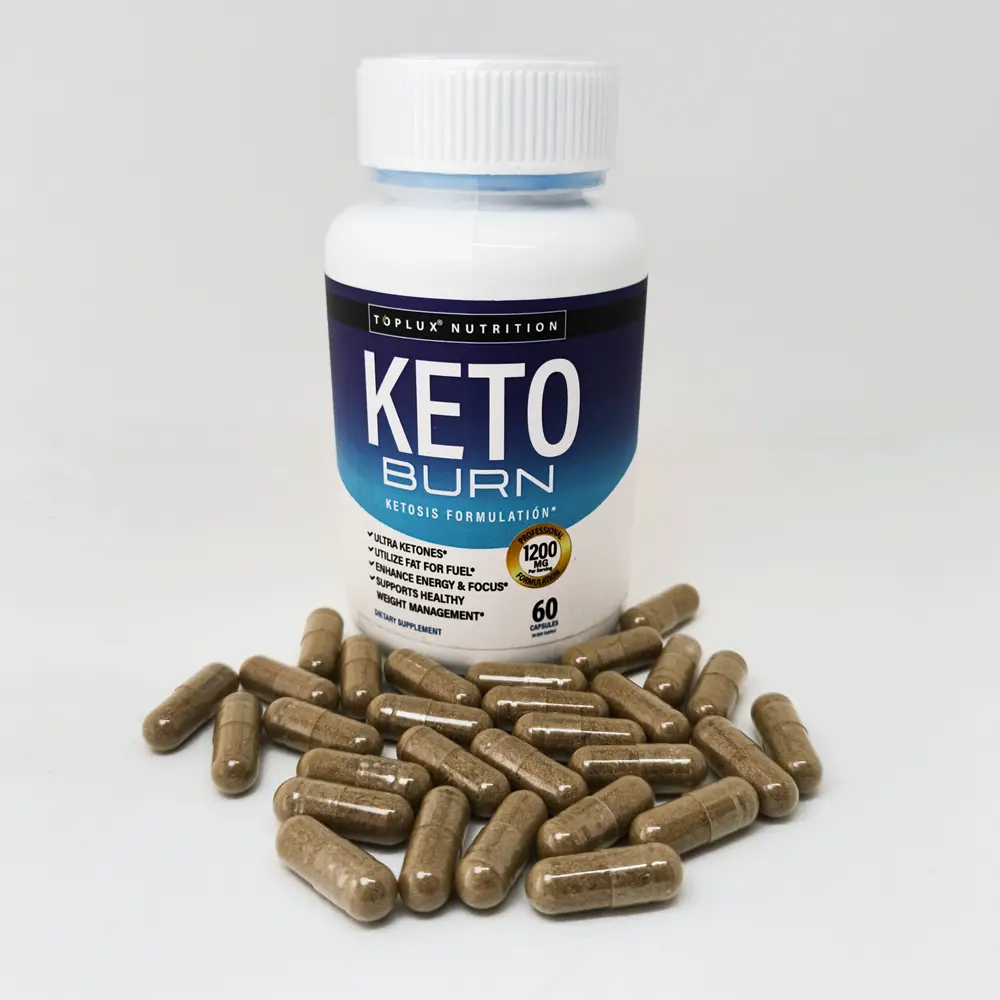Suplemento Keto Burn en cápsulas, frasco blanco con etiqueta azul y dorada, rodeado de 25 cápsulas marrones.