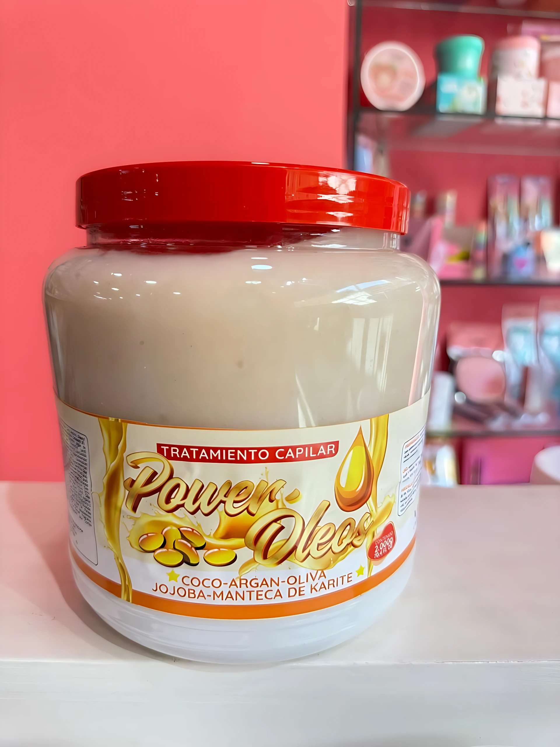 Tarro grande de tratamiento capilar Power Oleos con tapa roja, contenido 2000g, ideal para revitalizar y nutrir el cabello.