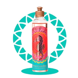 Aceite bronceador D'Luchi con seahorse en envase transparente, tapa dorada, fondo circular turquesa.