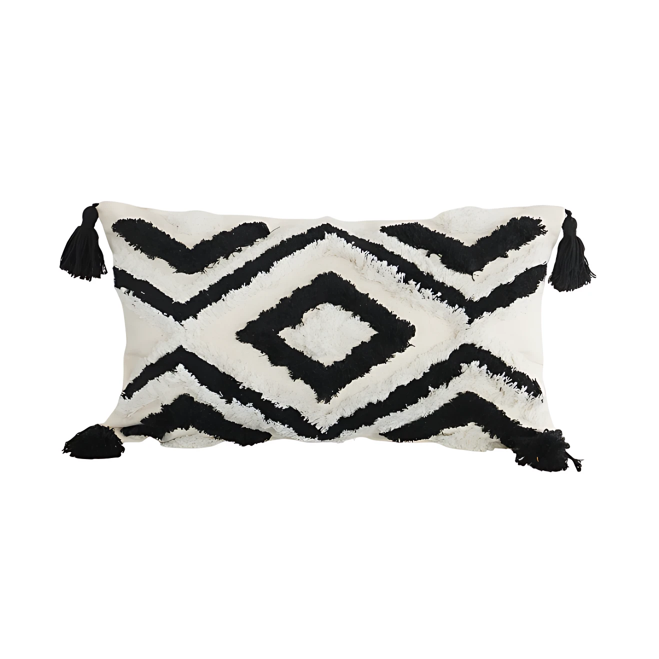 Cojín rectangular blanco con diseño geométrico negro y flecos, estilo moderno.