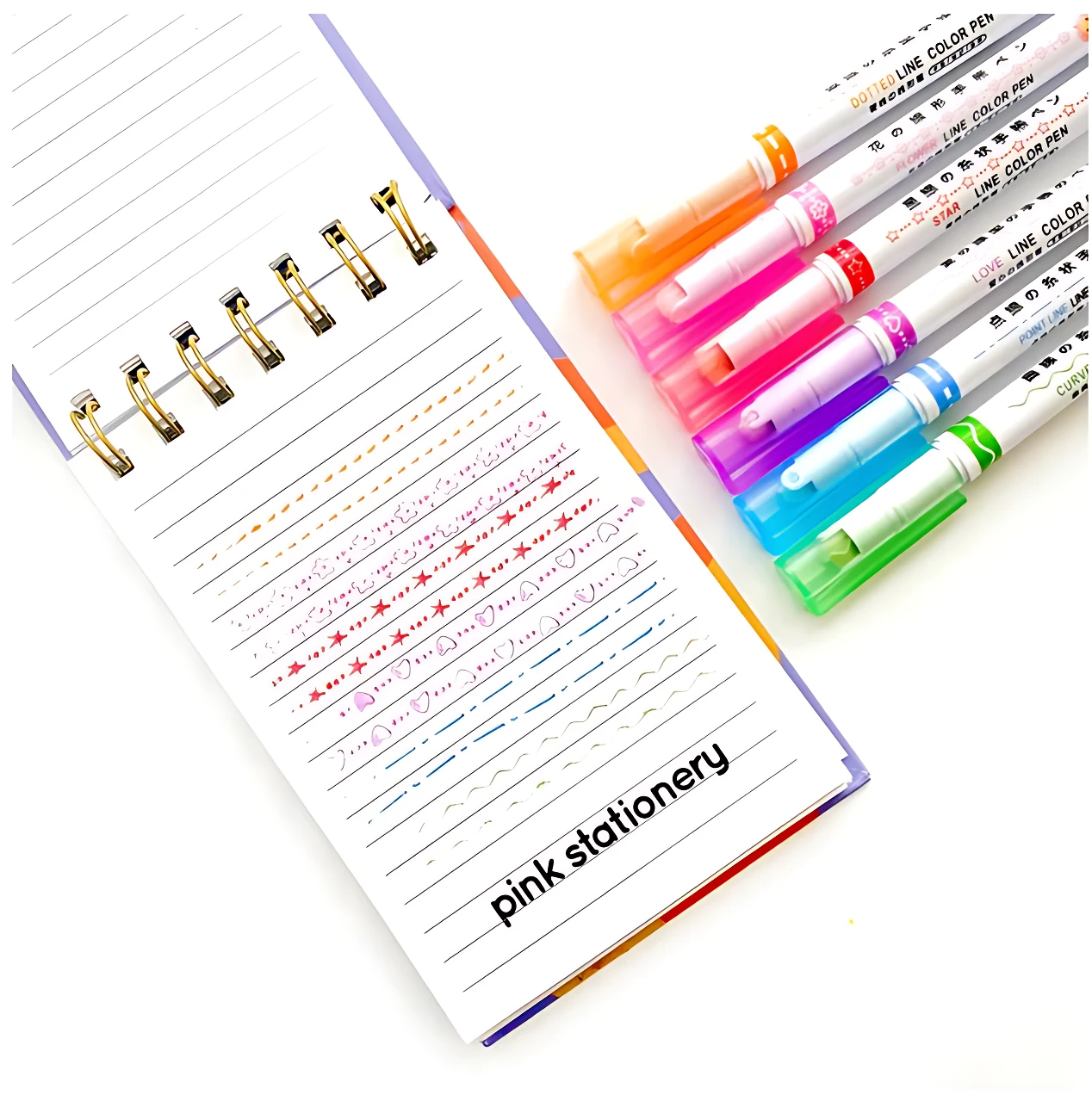 Set x6 rotuladores de línea curva y decorativa sobre cuaderno de espiral.