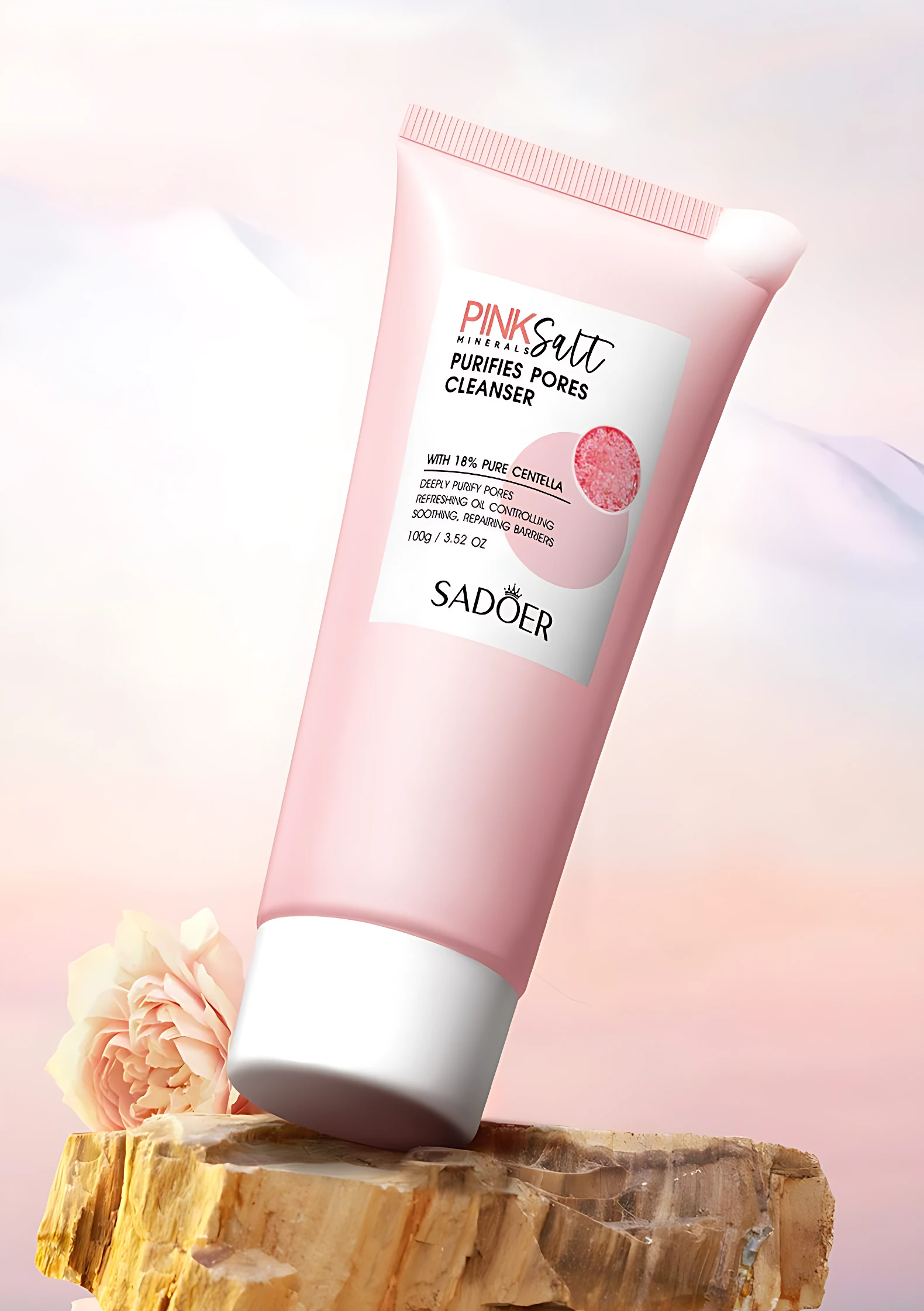Tubo rosado Sadoer Pink Salt Purifies Pores Cleanser 100g con flor y roca.