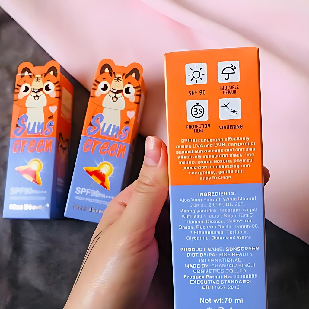 Caja naranja de protector solar "Suns creen" con diseño de tigre, SPF90, multi-reparación y blanqueamiento.