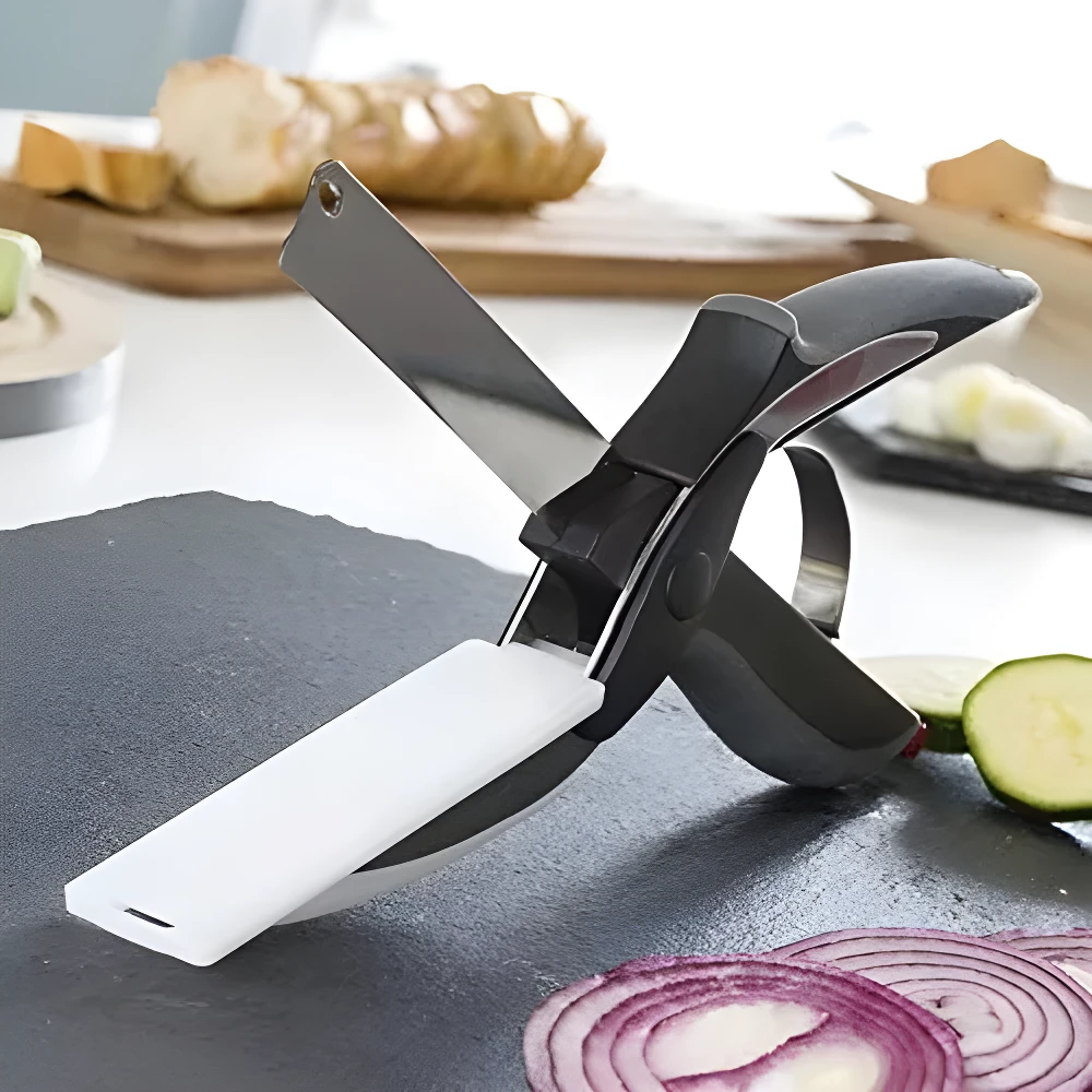 Tijeras picadoras de alimentos con mango negro y hoja de acero inoxidable, ideales para picar vegetales en la cocina.